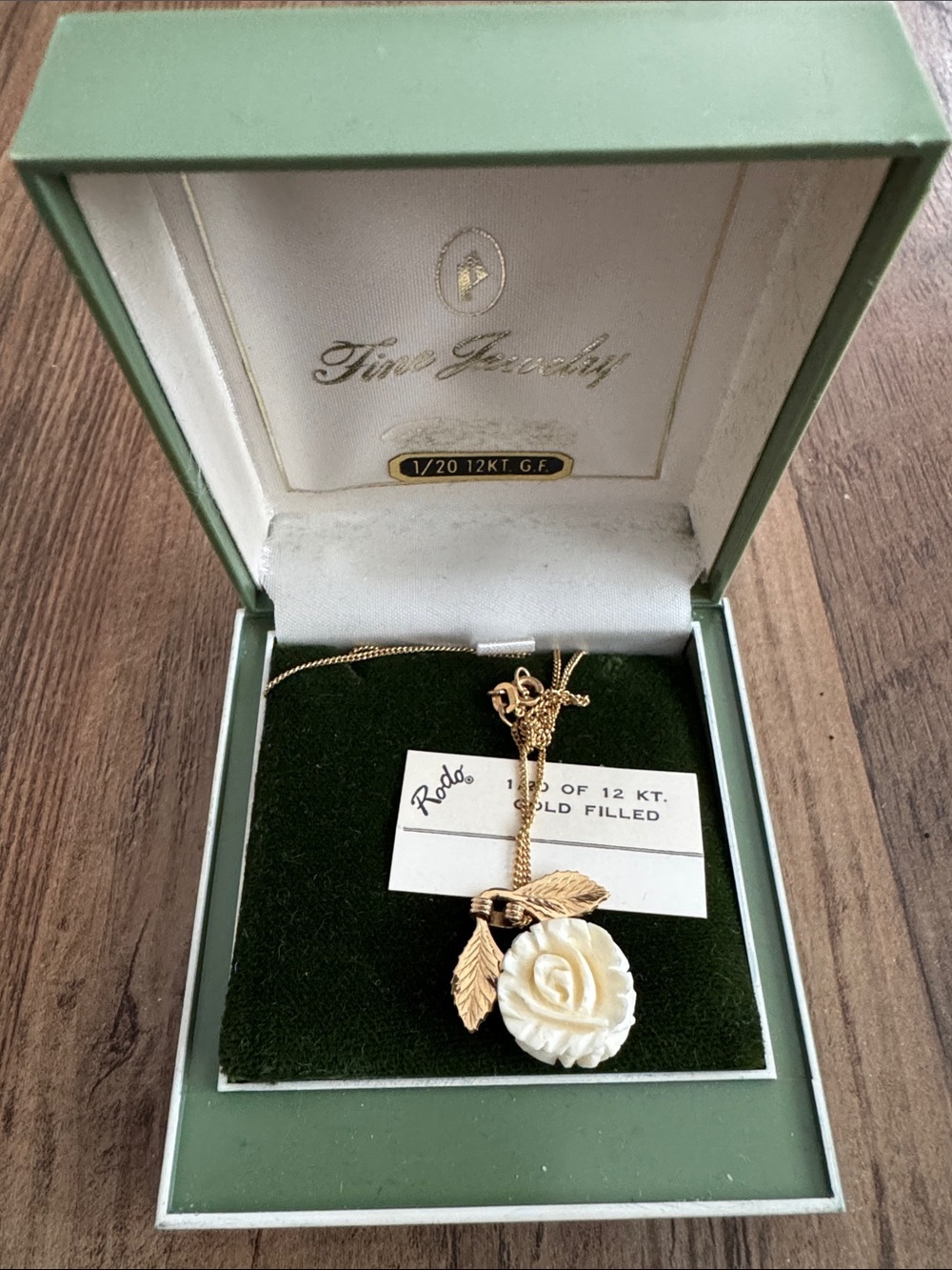Gold-Tone Necklace with Cream Rose Pendant and Leaf Accents